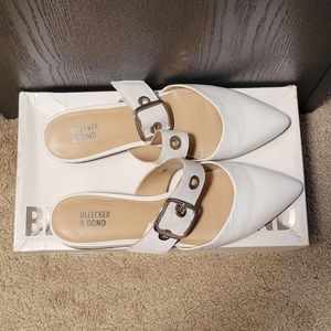 Bleecker and Bond White Buckle Mules
